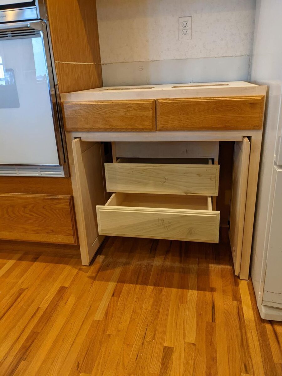 custom made cabinet with white oak cutting board, ADA accessible