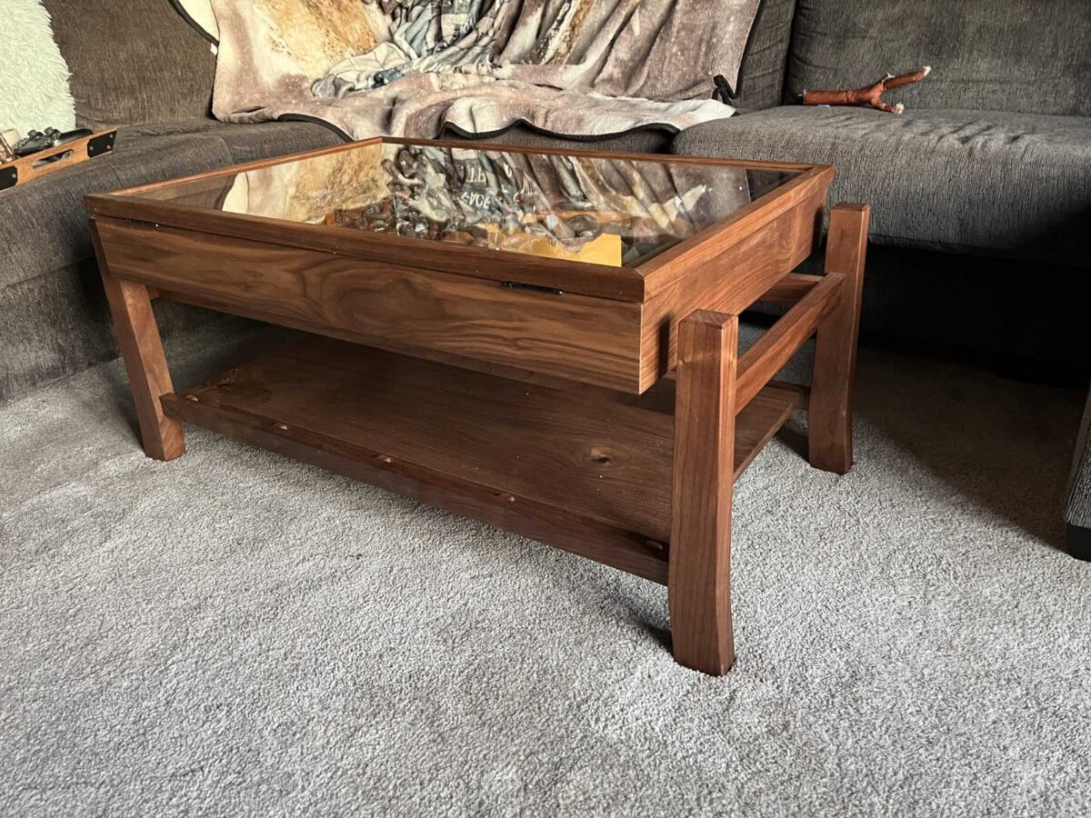 walnut display coffee table with glass hinged lid to display client's collection of agate stones