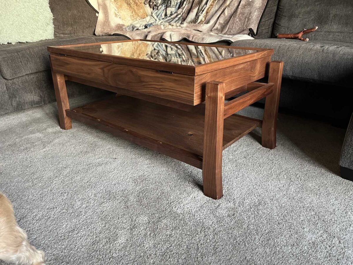 walnut display coffee table with glass hinged lid to display client's collection of agate stones