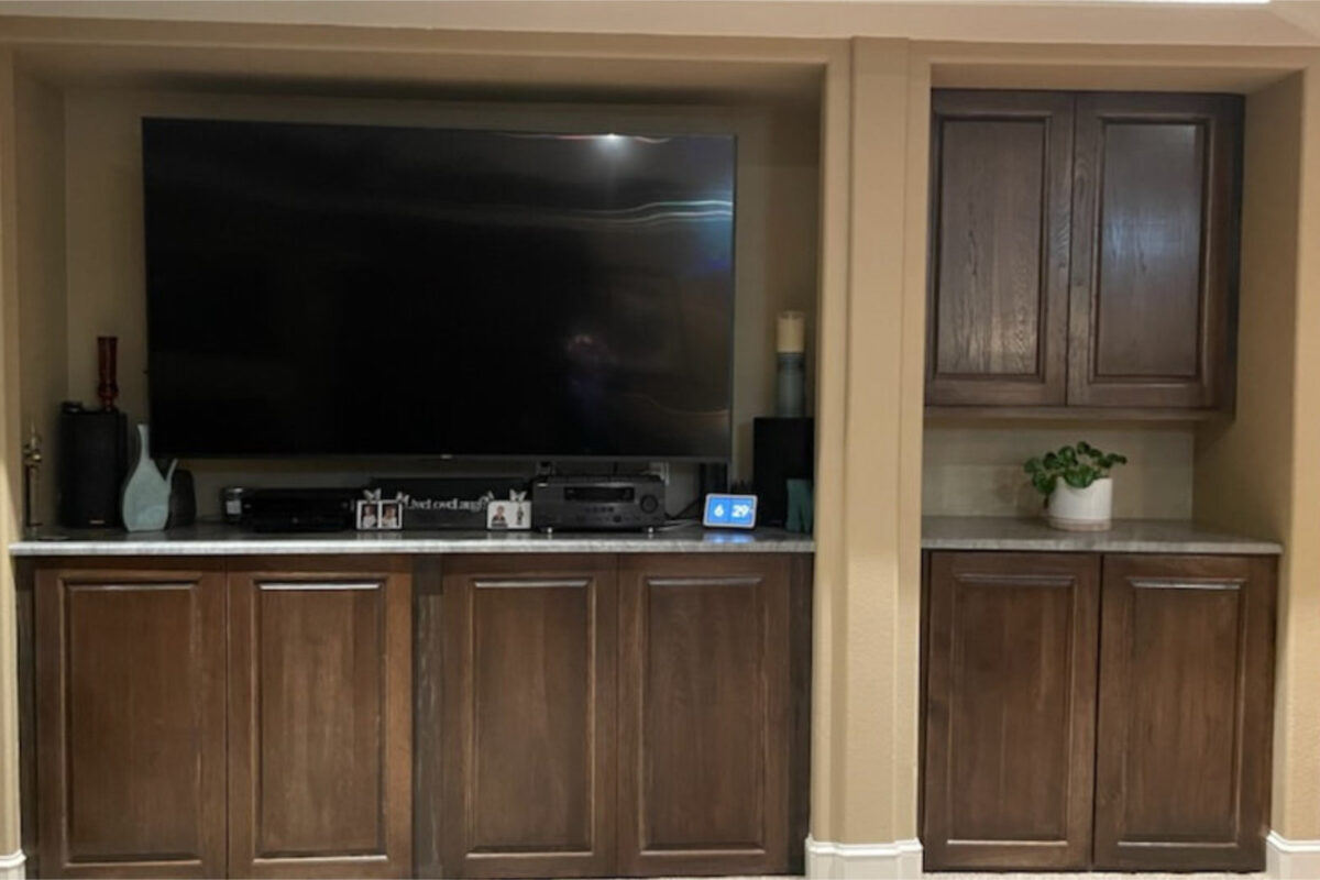 Built in Entertainment center with adjacent storage and counter space for entertaining