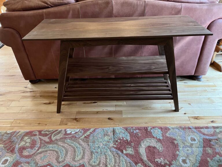 solid walnut sofa height table, with natural finish, end angle showing legs, mortise and tenon joints